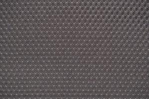 Grey nylon fabric textured background with hexagonal shape photo