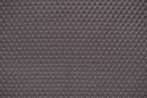 Grey nylon fabric textured background with hexagonal shape photo