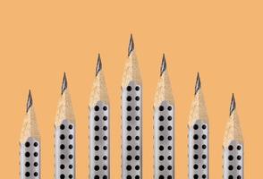 Graphite pencils with the fine tip on an ocher background photo