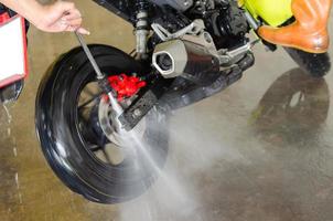 Washing a motorcycle photo