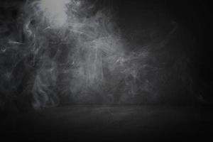 Smoke in a black room photo