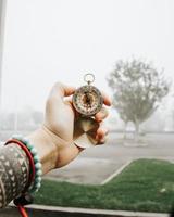 Person holding silver round coin photo