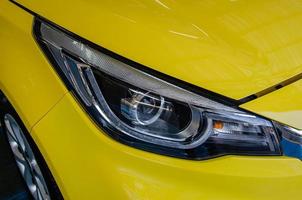 Yellow car headlights photo