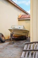 Hillsborough, New Hampshire, 2020 - White and brown boat on brown wooden dock during daytime photo
