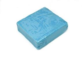 Blue plasticine isolated on white photo