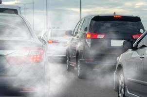 Car exhaust smoke from traffic photo