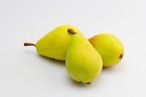 Yellow and green fruit pear on a white background photo