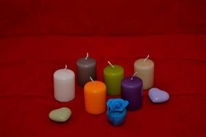 Colored candles with hearts photo