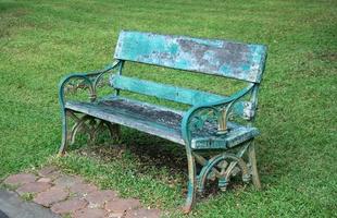 Blue bench in park photo