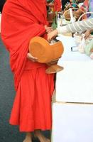 Monk with a basket photo