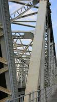 Railway line with iron bridge photo