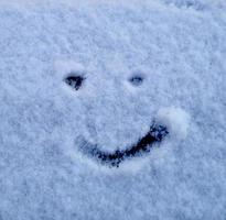 cara feliz en la nieve foto