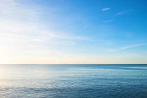 Blue water and sky during the day photo