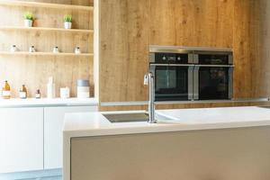 Clean sleek kitchen photo