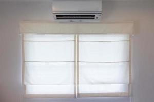 AC above a window photo