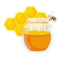 Panal con abeja volando y tarro de miel sobre fondo blanco.