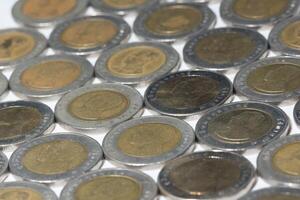 Coins on white background photo