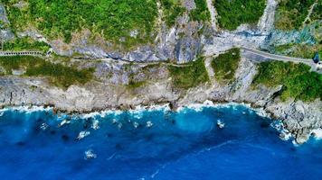 Looking down at a cliff photo