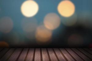Wooden table with soft bokeh photo