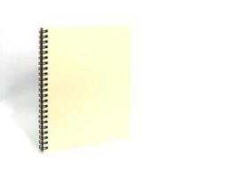 Yellow notebook on white photo