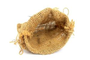 Burlap bag on white background photo