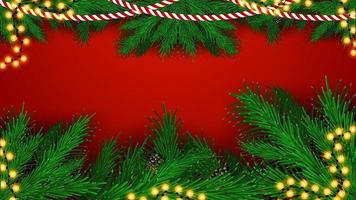 Christmas red background with frame of Christmas tree branches and garlands, blank for your art vector