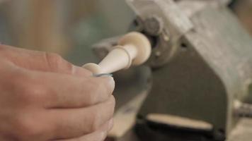 Man Using Sandpaper to Grind video