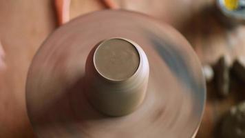 Potter Carves the Neck of A Clay Teapot video