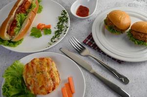 Sausage bread with hotdog and hamburgers photo