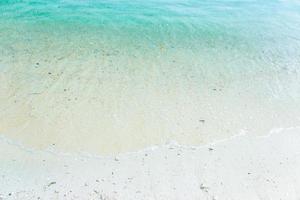White sand with blue water photo