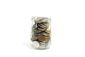 Coins in a glass jar photo