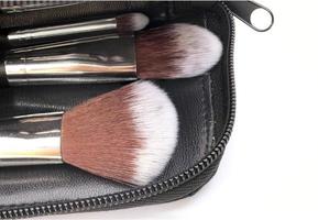 Close-up of makeup brushes photo