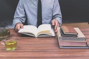 Person reading book photo