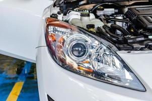 Polishing car headlights photo