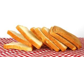 Bread on tablecloth photo