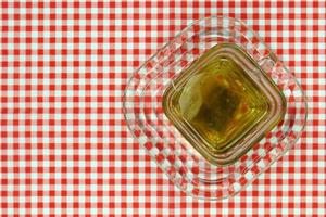 Tea on checkered tablecloth photo