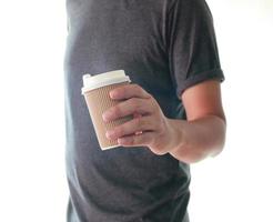 Man holding to-go cup photo