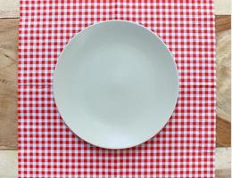 Top view of plate on cloth photo