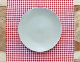 Top view of plate on cloth photo