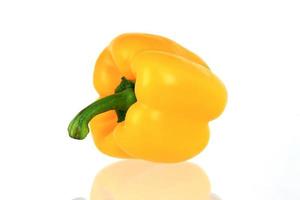 Yellow bell pepper isolated on white background photo