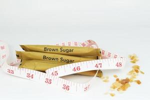 Brown sugar and measuring tape photo