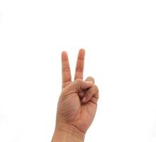Hand giving peace sign photo