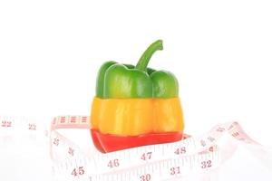 Bell pepper and measuring tape photo