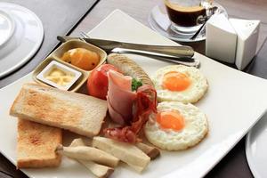 Breakfast on a plate with espresso photo