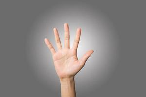 Close-up of a woman's hand isolated on white background photo