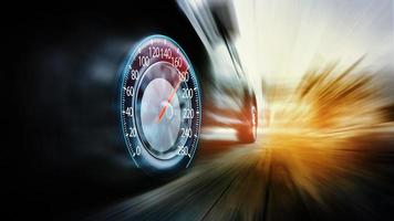 Speeding car and speedometer photo