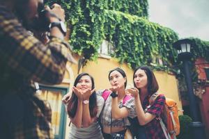 Group of friends meeting in the city center photo