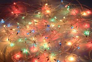 Christmas lights on dark background photo