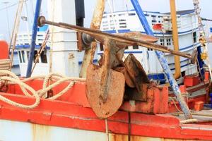 Rusty old anchor photo