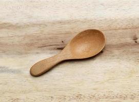 Brown wooden spoon photo